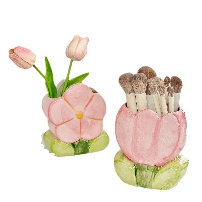 Ceramic flower pen holder storage box in a floral design on a desk
