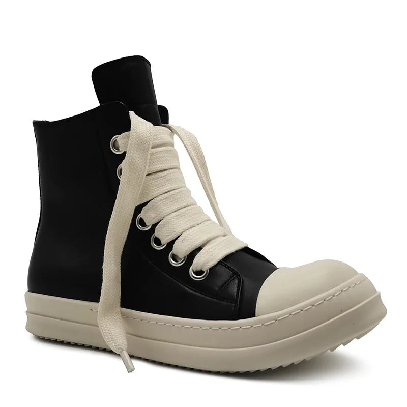 Black high-top genuine leather boots with side zip detail on a white background.