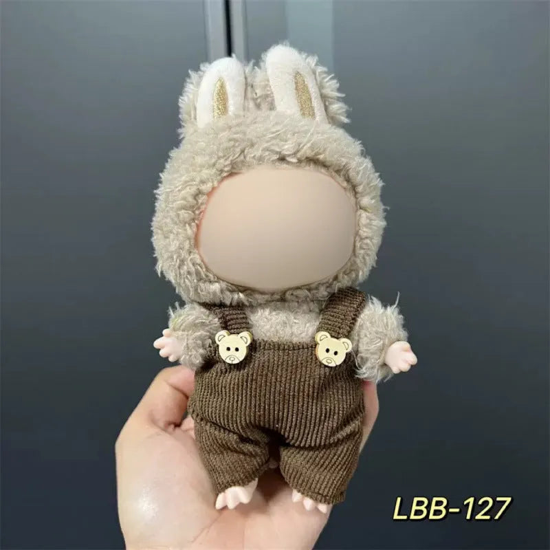 Plastic doll clothes for a 17cm tall vinyl figure on a white background.