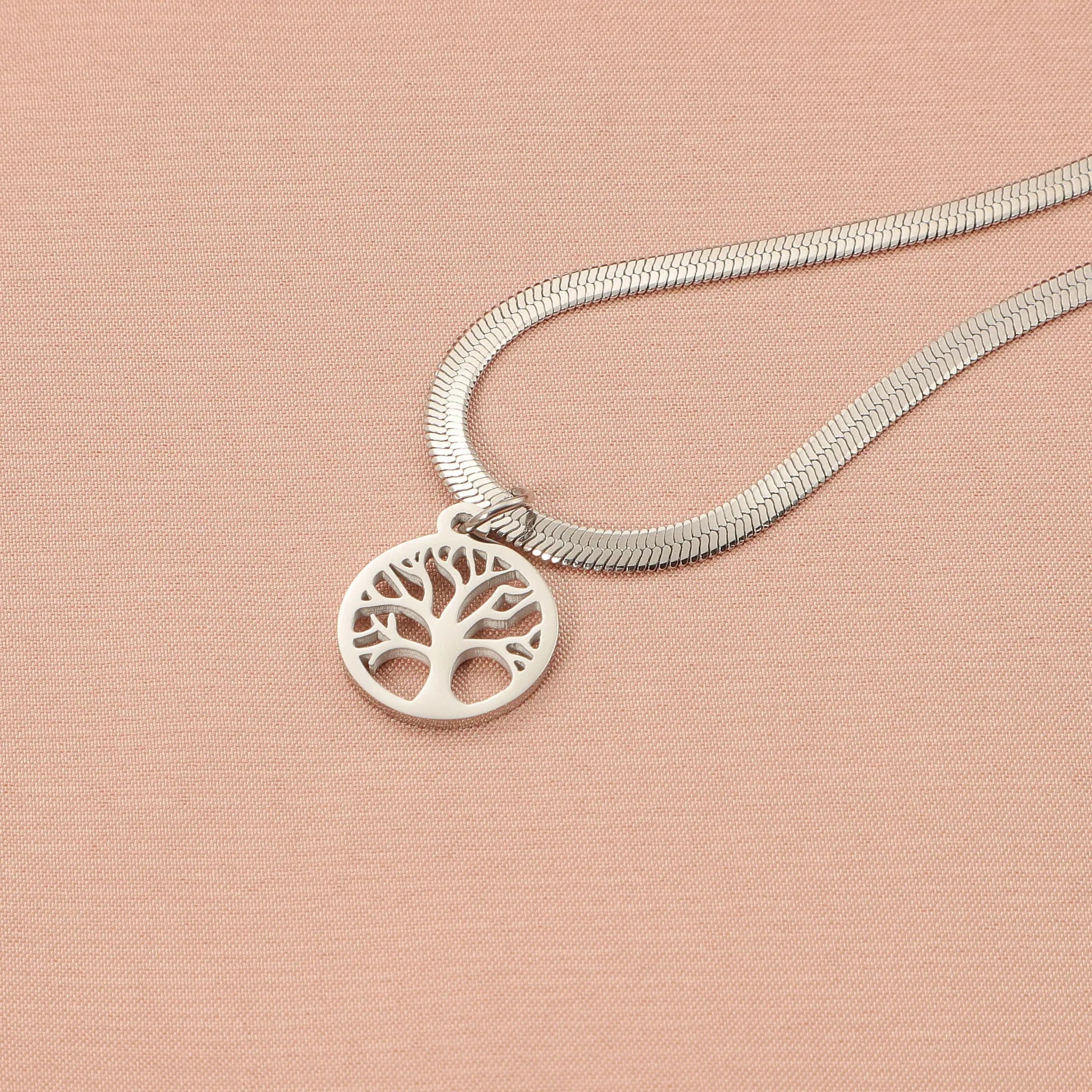 Stainless steel necklace with a U-shaped tree pendant on an adjustable snake chain.
