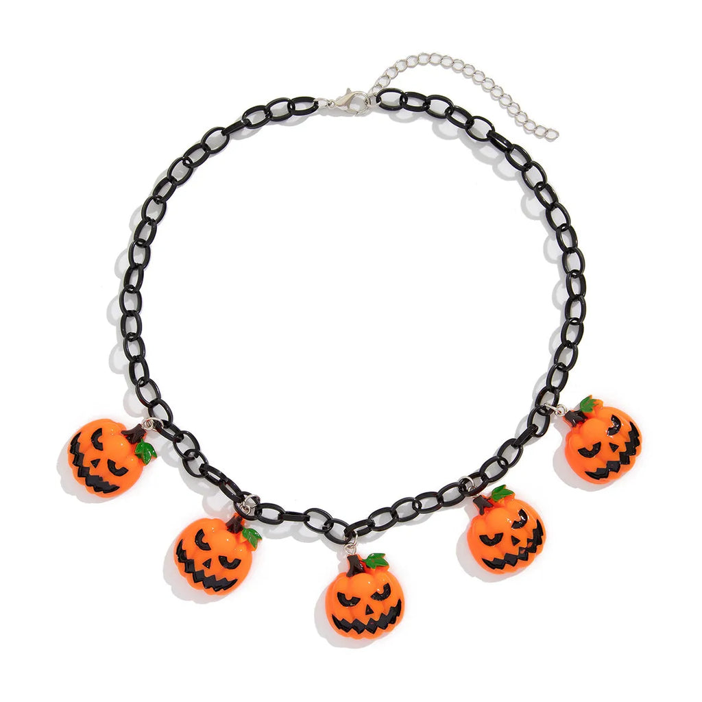 Halloween necklace showing a cartoon ghost and pumpkin acrylic pendant on a chain, colour 06705.