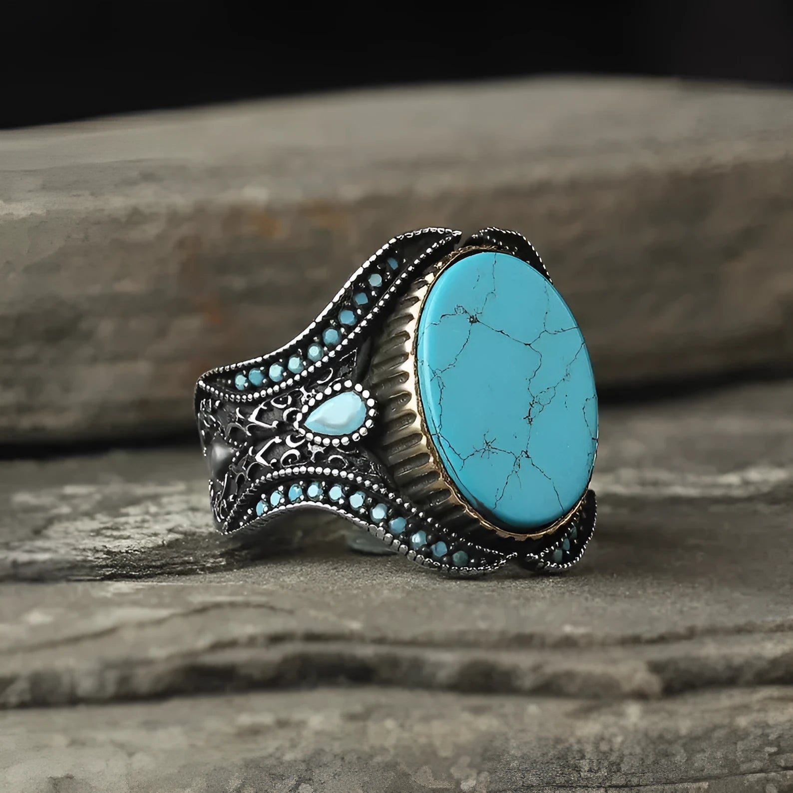 Men's round turquoise ring in antique silver alloy showing simple design and metallic finish