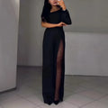 Black women's long sleeve jumpsuit with an oblique shoulder neckline and a high slit on the leg.
