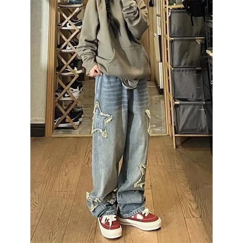 Blue women's high-waist straight-leg jeans on a neutral background.