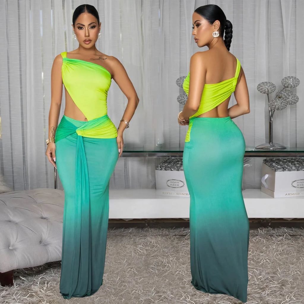 Women's brown gradient cross-shoulder sleeveless maxi dress with a high waist on a mannequin.