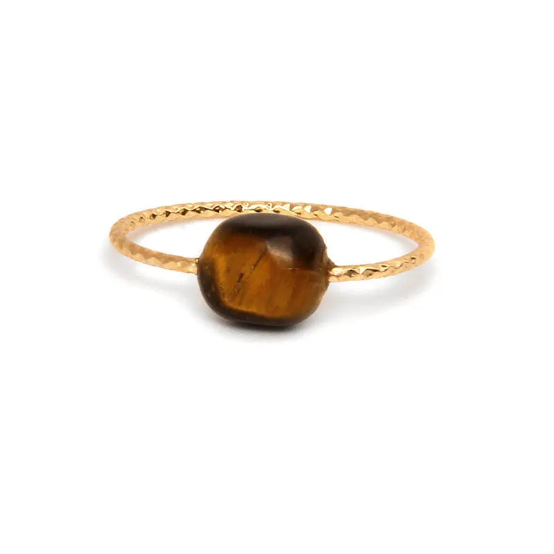 Women's geometric niche design ring with a coloured agate stone centrepiece.