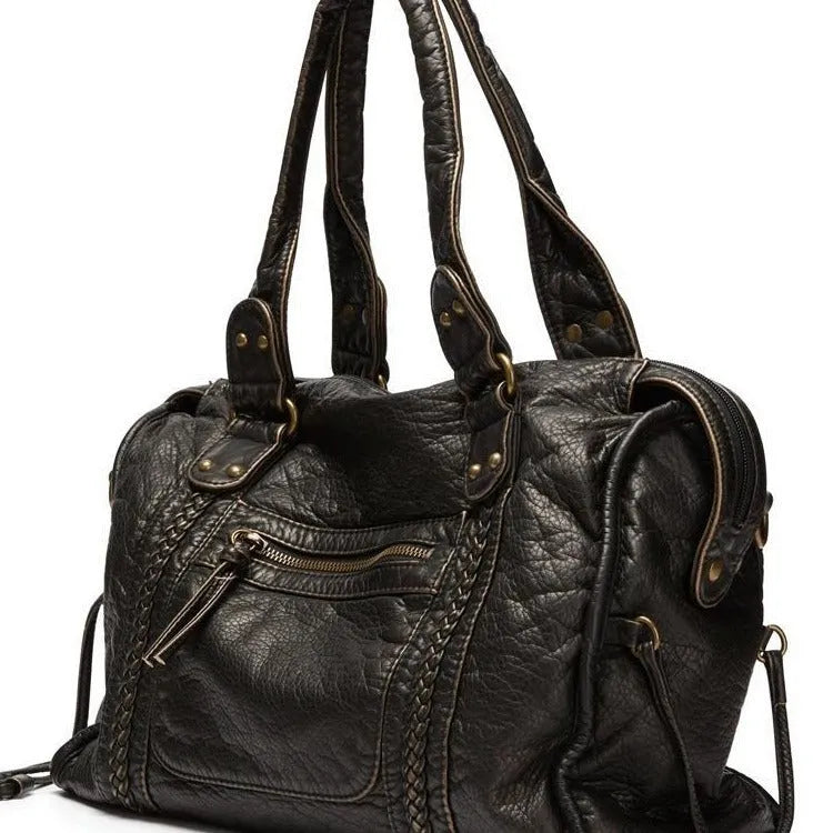 Women's retro motorcycle shoulder messenger bag in brown with weaving design elements and single adjustable strap