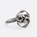 Titanium steel double snake ring in retro style with a steel colour finish, shown on a hand.