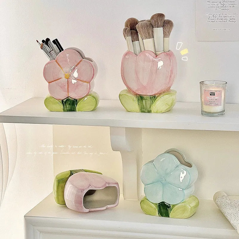 Ceramic flower pen holder storage box in a floral design on a desk