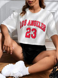 Black personalised '23 Letters' printed cotton T-shirt with loose fit and exposed navel style on a mannequin.