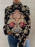 Black 3D pattern turtleneck long sleeve loose-fit pullover sweater on a hanger.