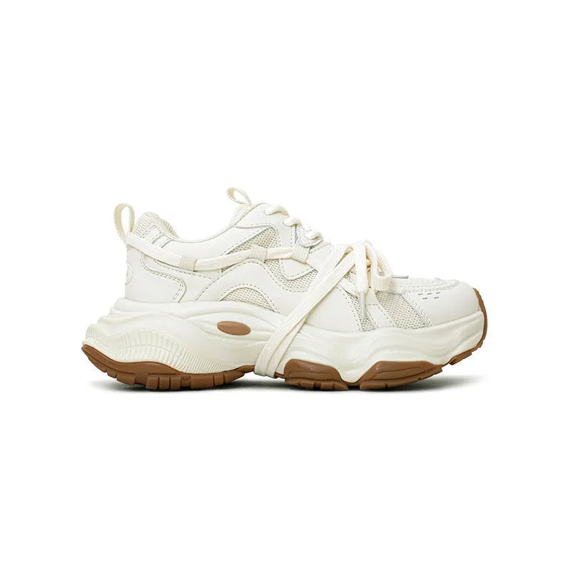 Beige women's platform heel dad sneakers with round toe and front lace-up fastening.
