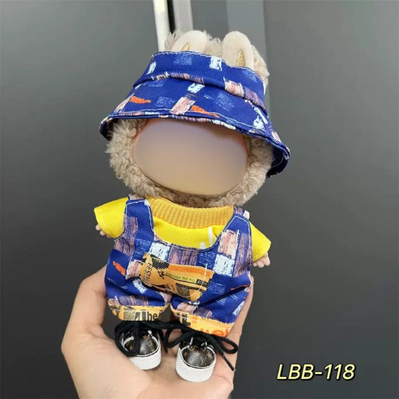 Plastic doll clothes for a 17cm tall vinyl figure on a white background.