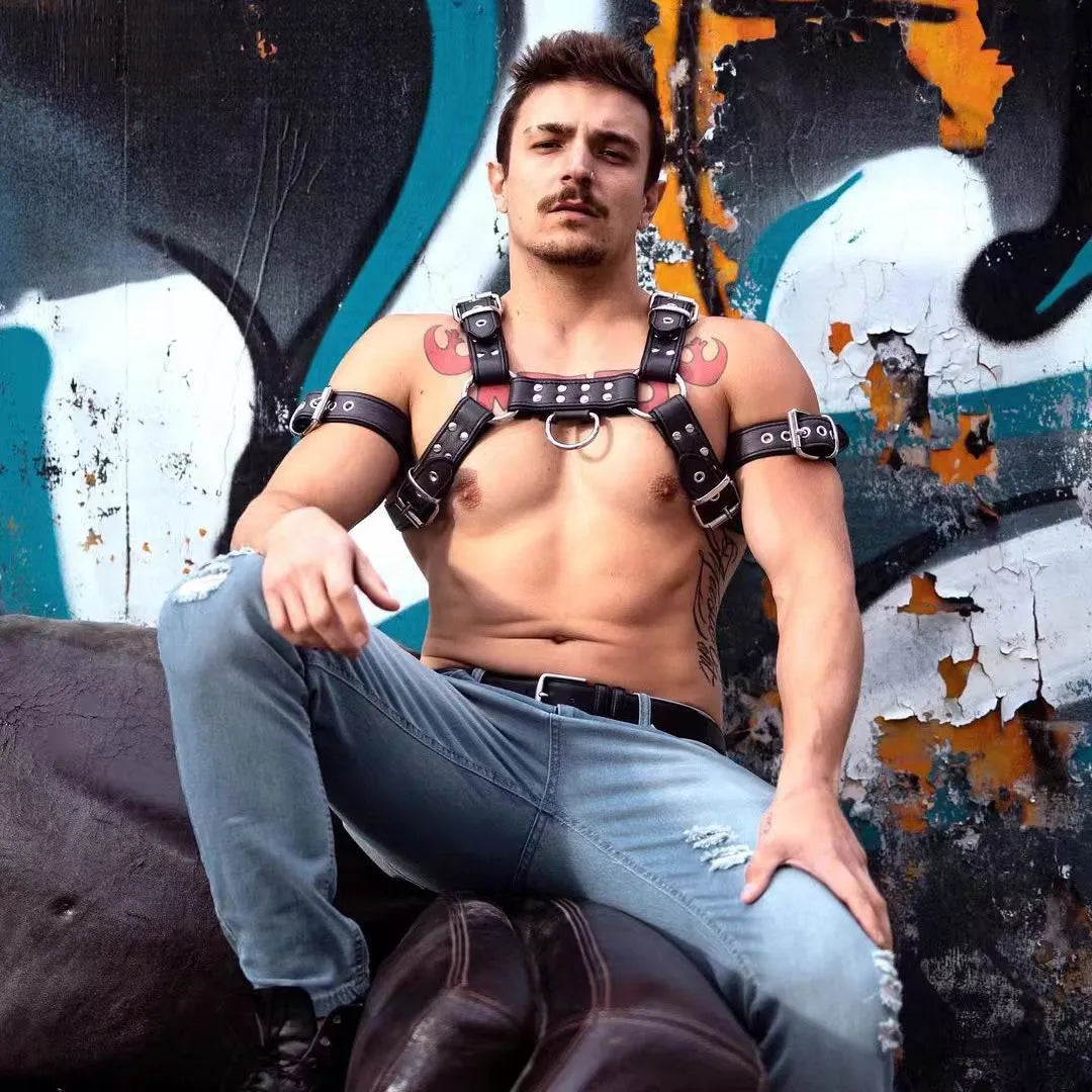 Black leather chest muscle bondage strap with metal buckle adjustment for adult costume use