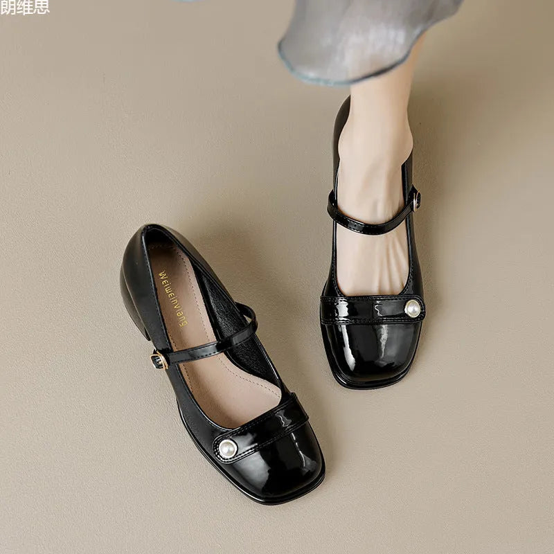 Plus size patent leather ankle boots with buckle and chunky heel in apricot, black, or wine red.