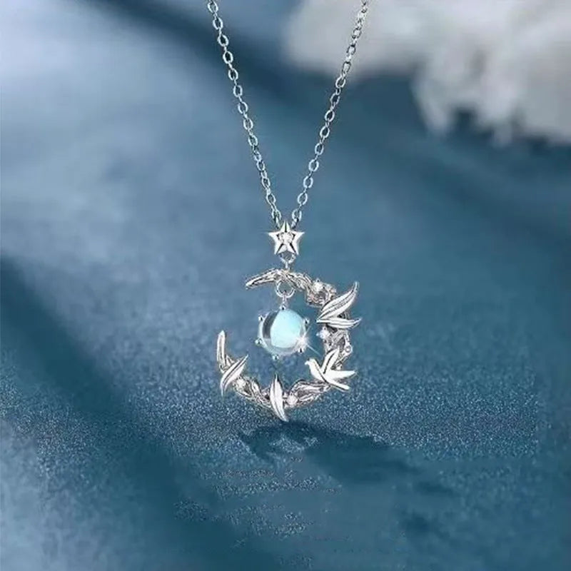 Tree and bird pendant necklace with adjustable chain and alloy construction