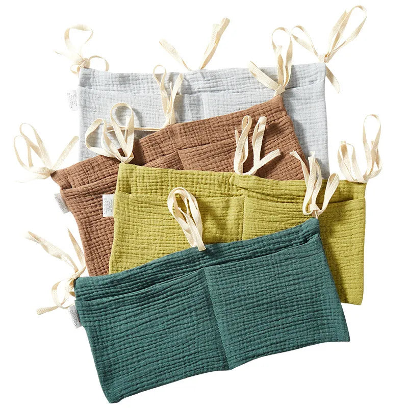 Cotton double layer baby bedside buggy bag in colour option, attached to a cot for storage