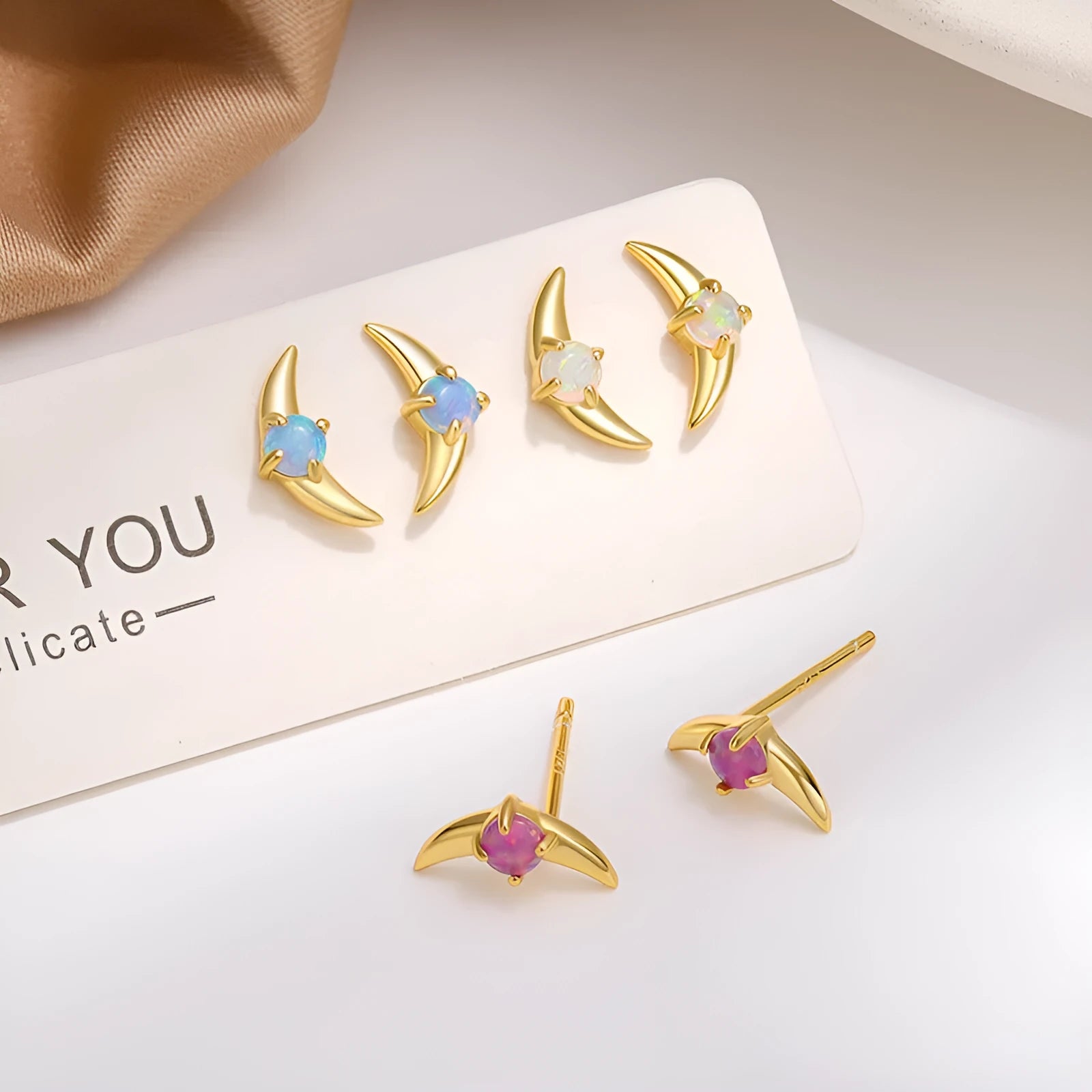 Geometric 925 silver earrings with stone accents in gold or platinum colour