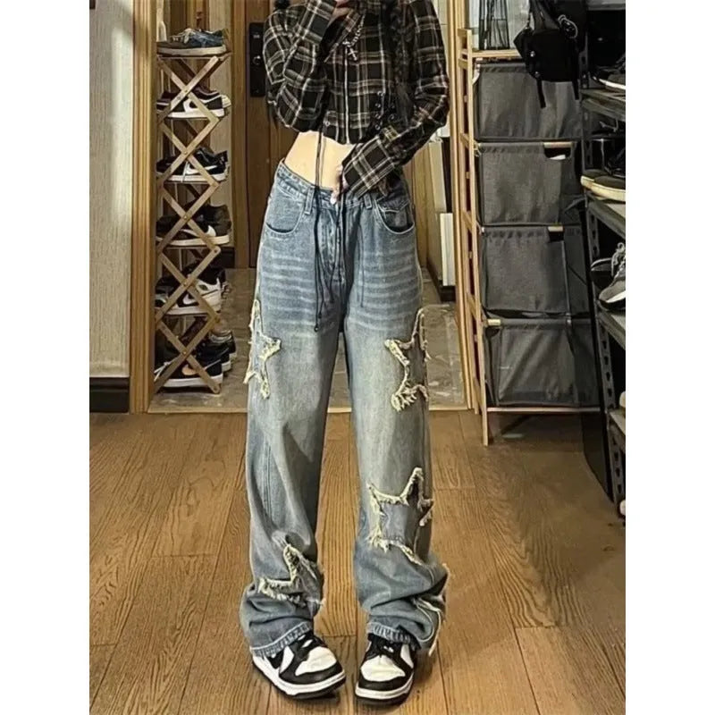 Blue women's high-waist straight-leg jeans on a neutral background.