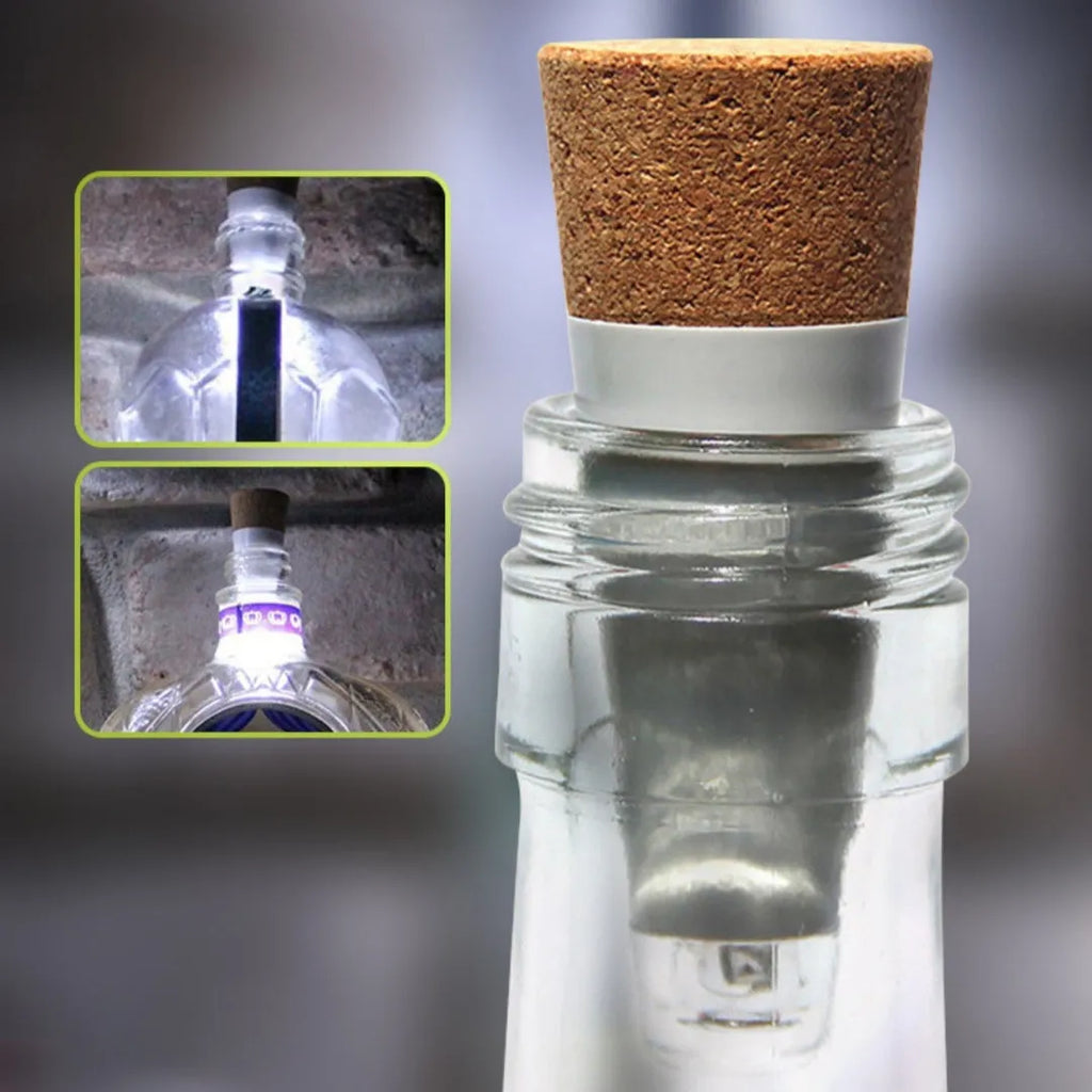 White plastic USB-rechargeable LED cork light for bottle decoration, showing compact size.