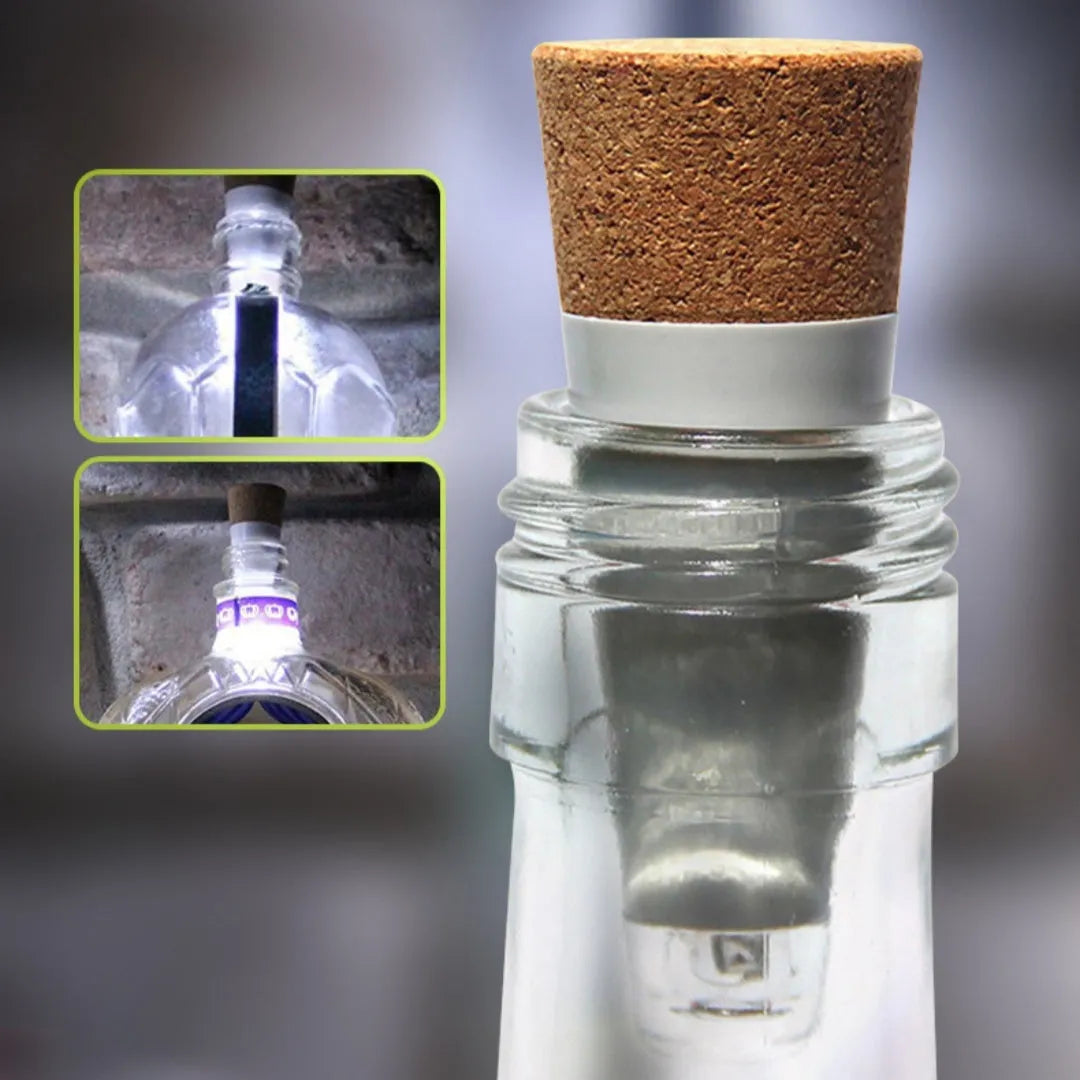 White plastic USB-rechargeable LED cork light for bottle decoration, showing compact size.
