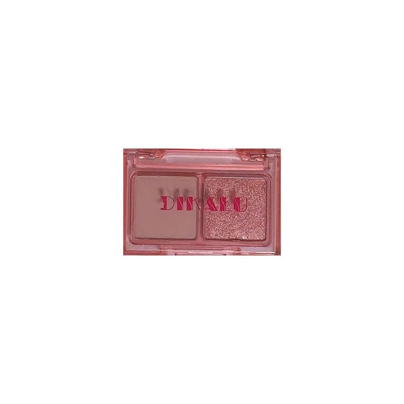 Cool two-tone eye shadow plate showing pink and black matte shimmer colours in a standard cosmetic compact.