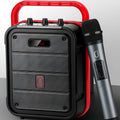 MS62AI portable Bluetooth karaoke speaker with wireless microphone and remote control on table.