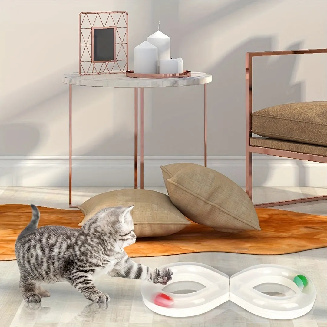 Multipack of four cat toys including a blue turntable track, a ball, and a teasing stick.
