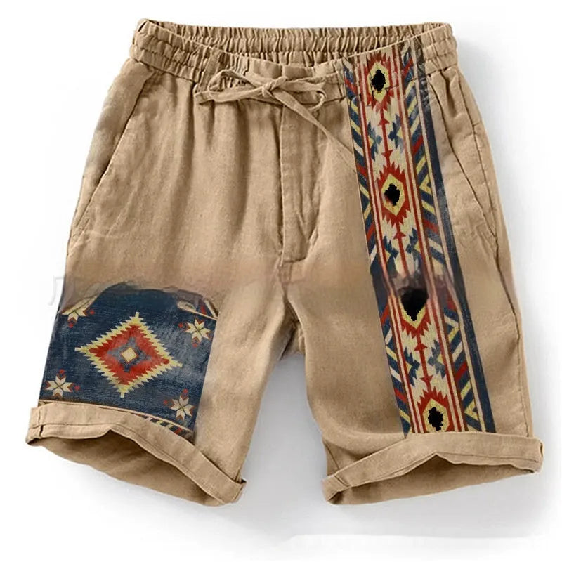 Man wearing blue loose-fitting casual shorts with a digital colour block pattern and a drawstring waist.