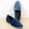 Blue suede-effect women's flat loafers with a black rubber sole, shown in a size 38.