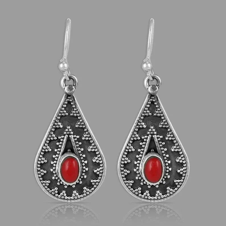 Silver water drop earrings with red pine gemstone on zinc alloy backing