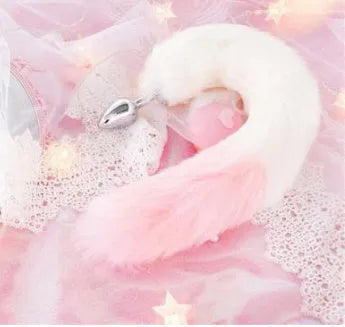 Pink PU leather manual craft adult toy docking plug lying on a light background