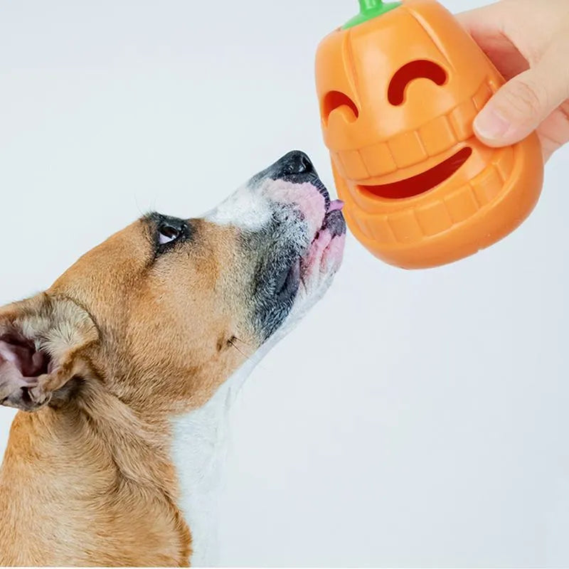 Yellow pumpkin-shaped TPR dog chew toy measuring 8.6x11.5cm for aggressive chewers