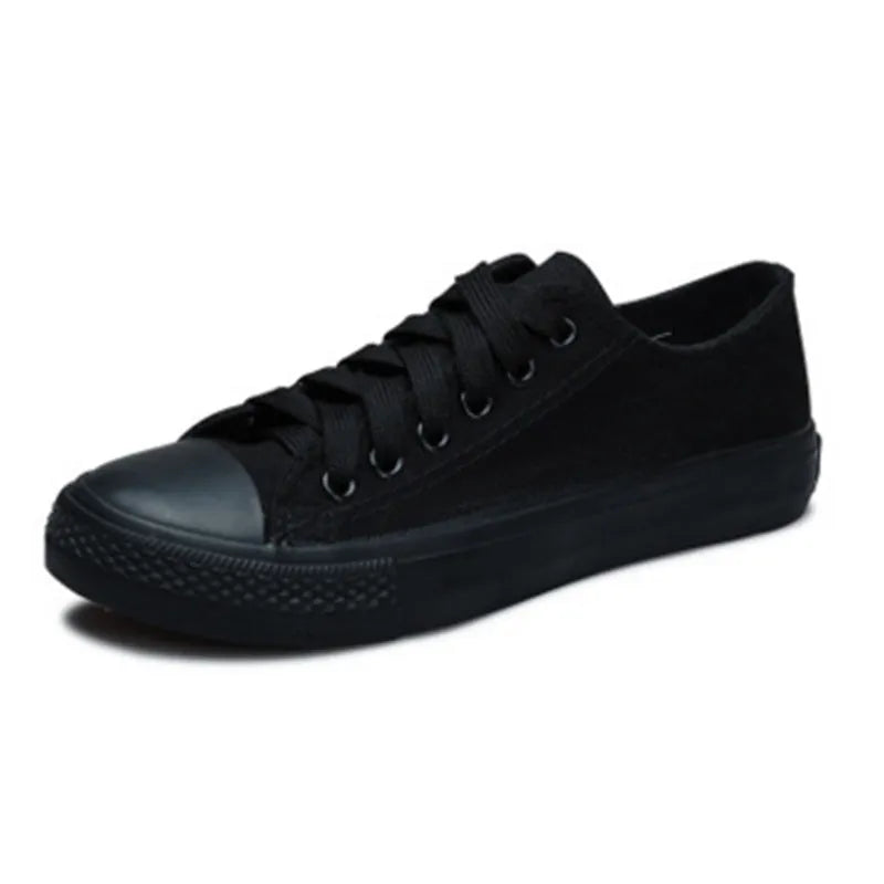 Women's solid-colour canvas shoes in black, white black, white red, or all black colour options
