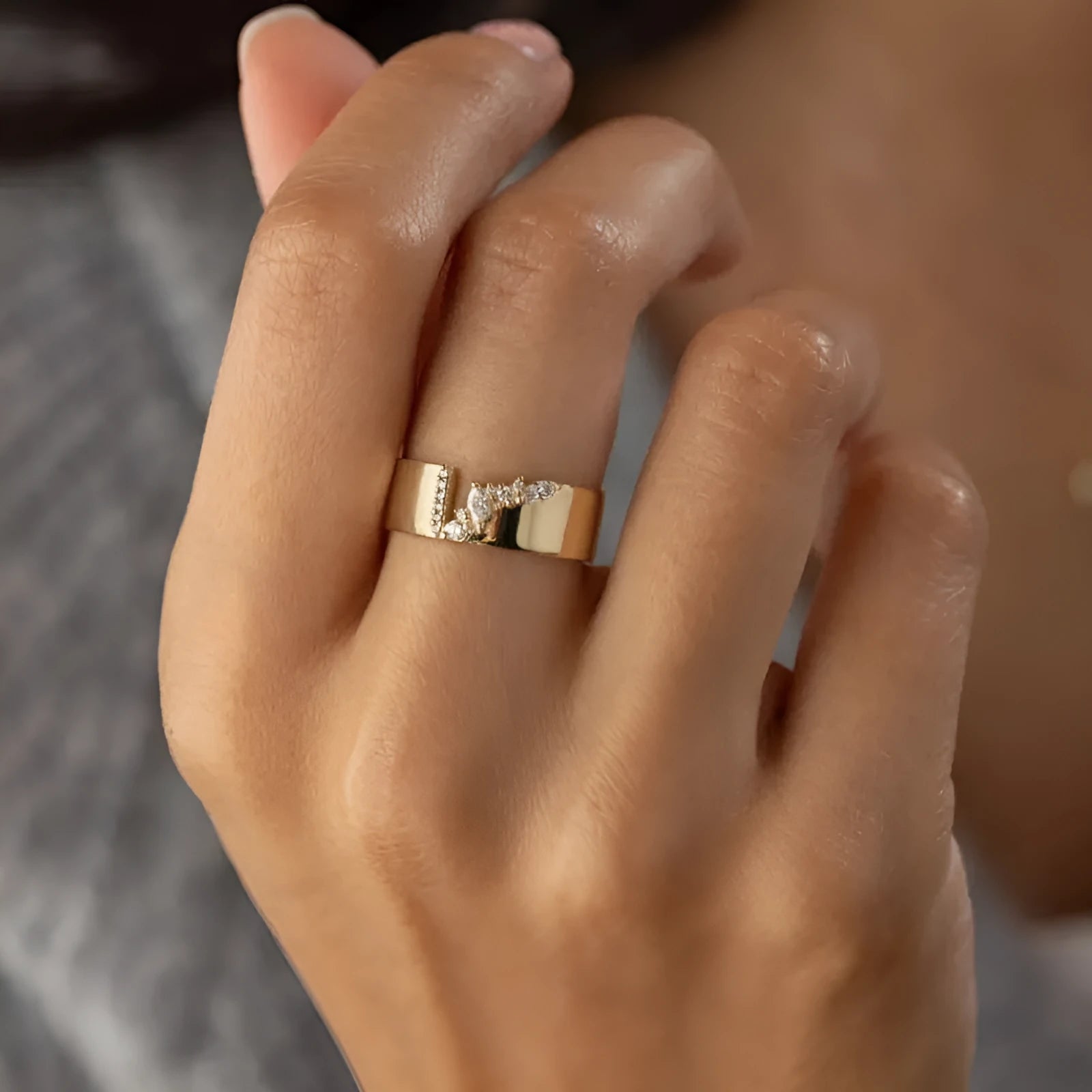 Gold electroplated copper women's ring with a cubic zirconia stone, shown in size 8.