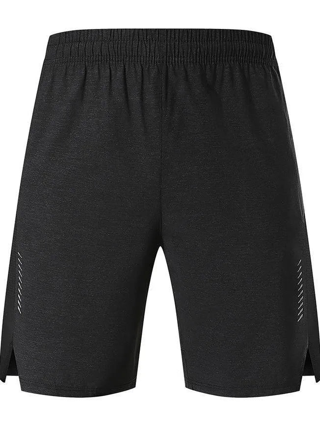 Man wearing forest green stretch spandex casual shorts with a mid-waist fit and shorts length.