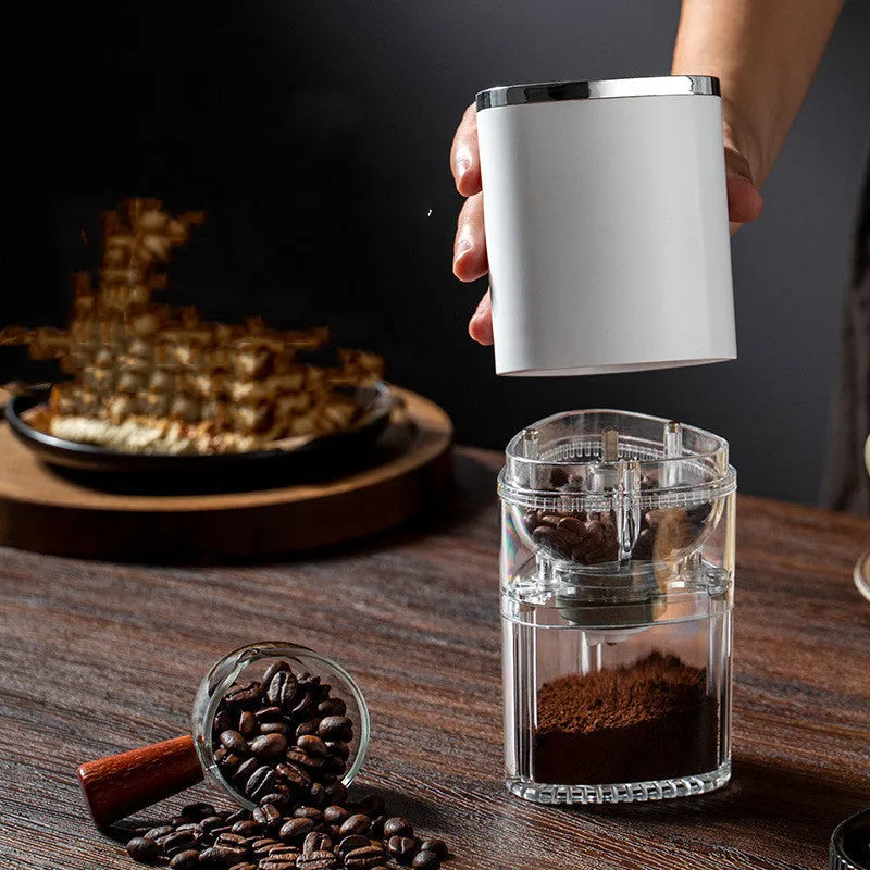 White portable electric coffee grinder with ceramic burr and USB charging cable