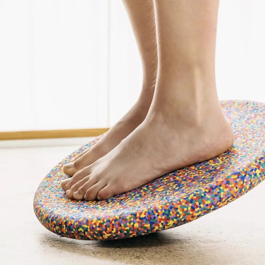 Plastic wood surf balance board for children in mixed colour or black finish.