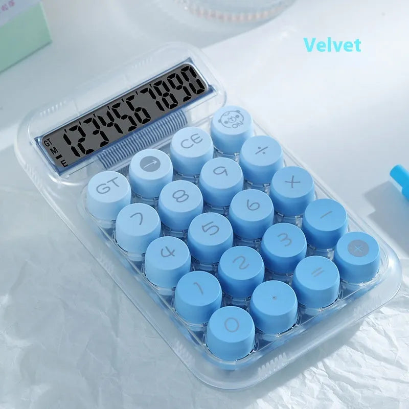 Keyboard-style gradient colour calculator in mute blue, green, pink, or purple on a desk.