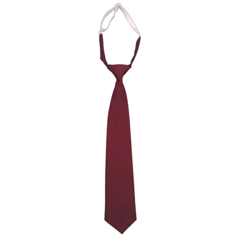 Men's arrow-style cotton bow tie in navy blue with tie-dye texture, laid flat showing its 35cm length.