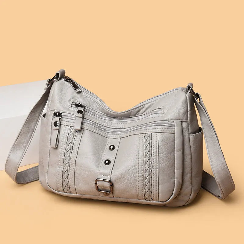 Fashionable versatile new soft PU shoulder messenger bag in horizontal square shape with slit pocket, available in five colours