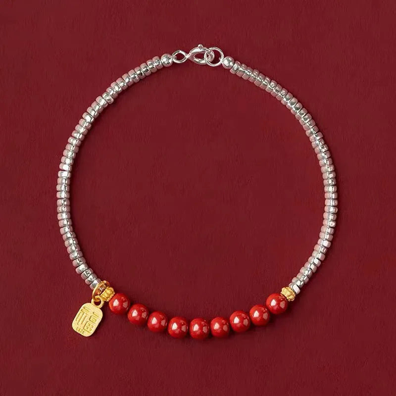Silver electroplated couple bracelet with small geometric lucky beads measuring 16 cm