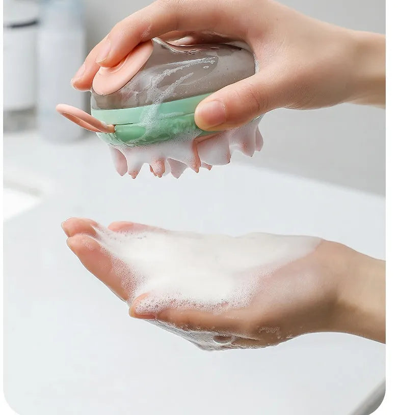 Blue pet grooming brush with integrated shampoo dispenser for bath time use with cats and dogs