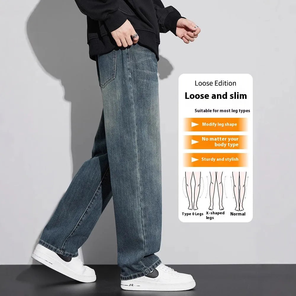 Retro straight-leg jeans for men in light blue cotton denim on a neutral background.