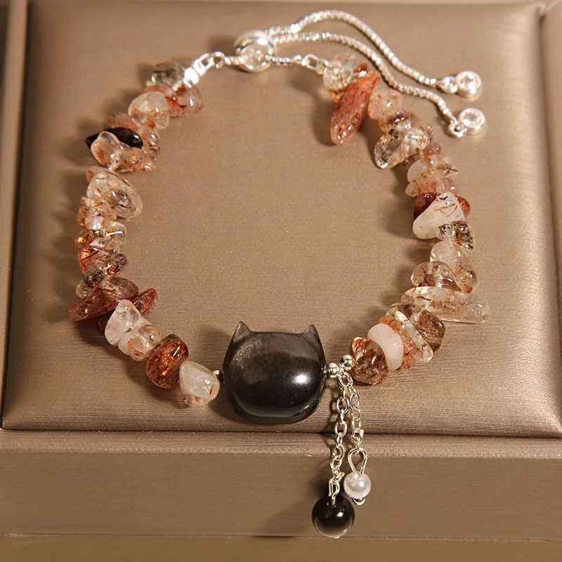 Women's crystal gravel bracelet with kitten charm in pink or agate colour.