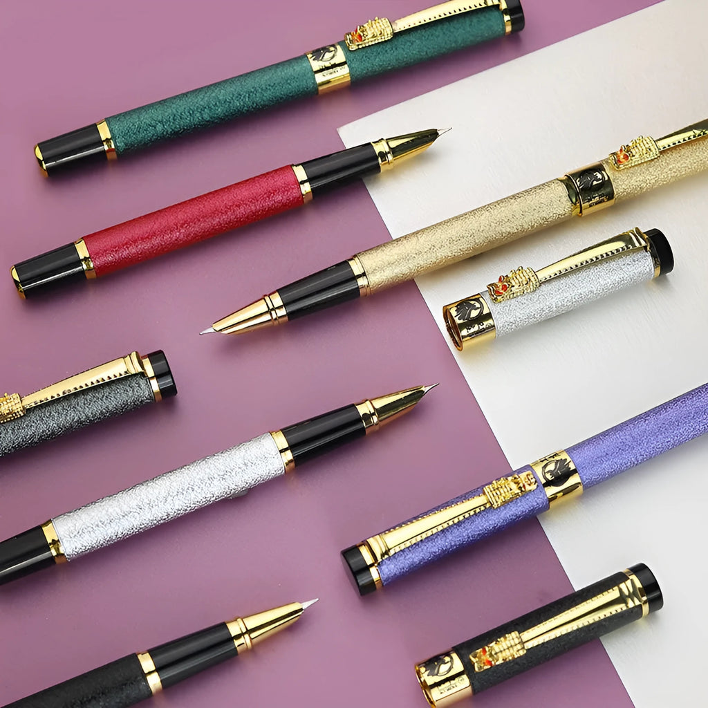 Metal fountain pen with iridium nib shown in one of seven colours: black, gold, green, grey, purple, red, or silver.
