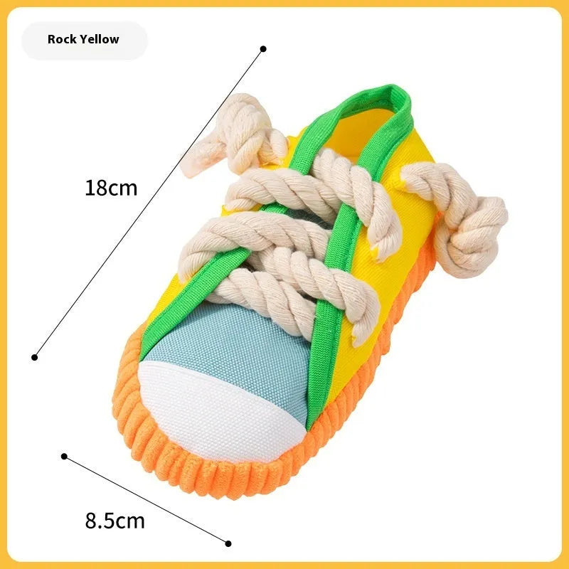 Plastic dog chew toy in yellow, black, or blue colours with a sound-making mechanism.