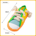 Plastic dog chew toy in yellow, black, or blue colours with a sound-making mechanism.