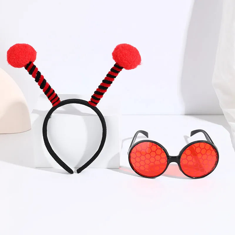 Yellow children's bee costume headband and matching bug-eye glasses for fancy dress parties.