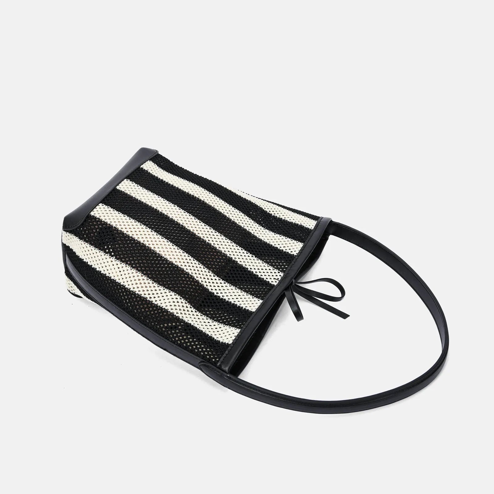 Black and white striped woven fabric women's bucket shoulder bag showing dimensions